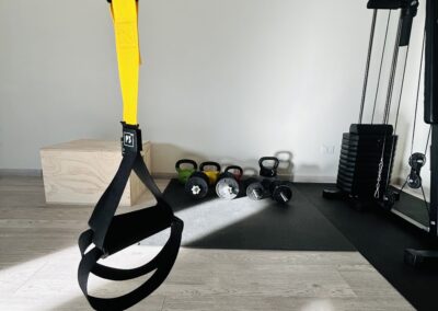 a gym with a yellow strap